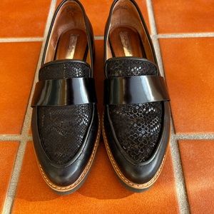 Women's black loafers.
